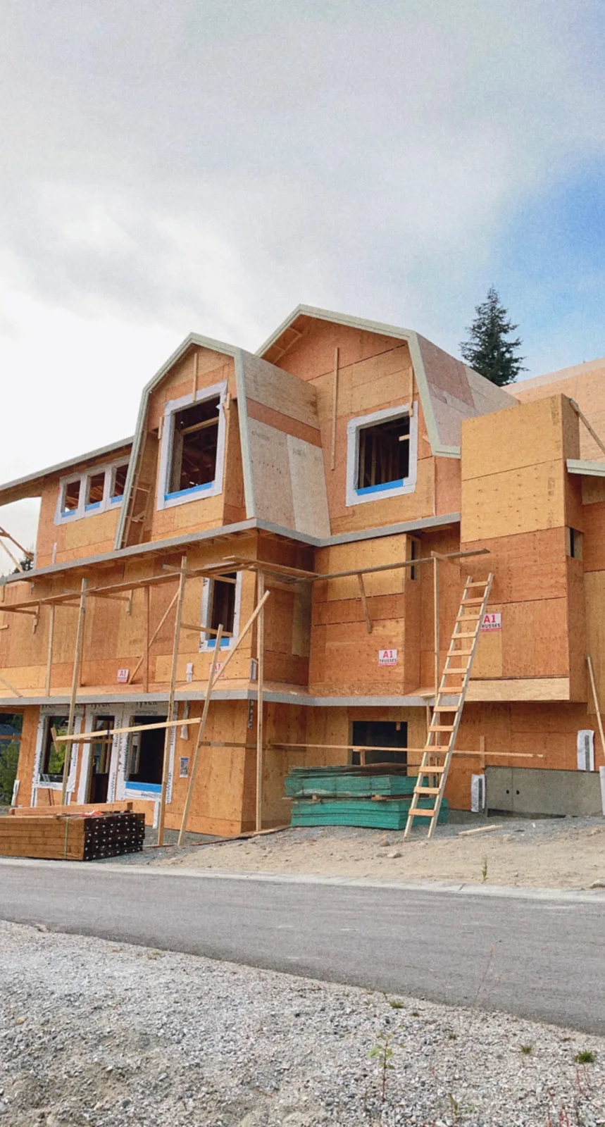 Second-storey addition framing with structural roofline tie-in