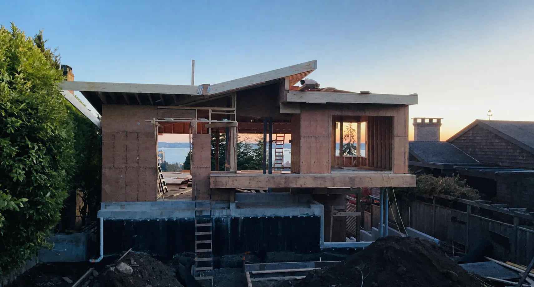 New custom home framing at sunset in the Lower Mainland